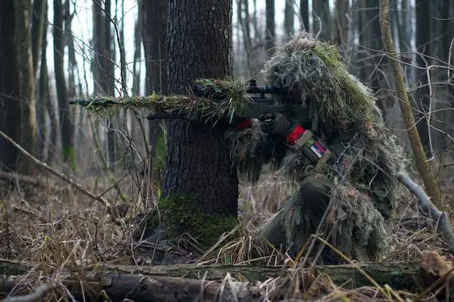 Airsoft sniper with gillie suit